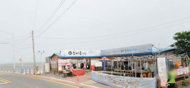 용유해변 위반 건축물 철거 전